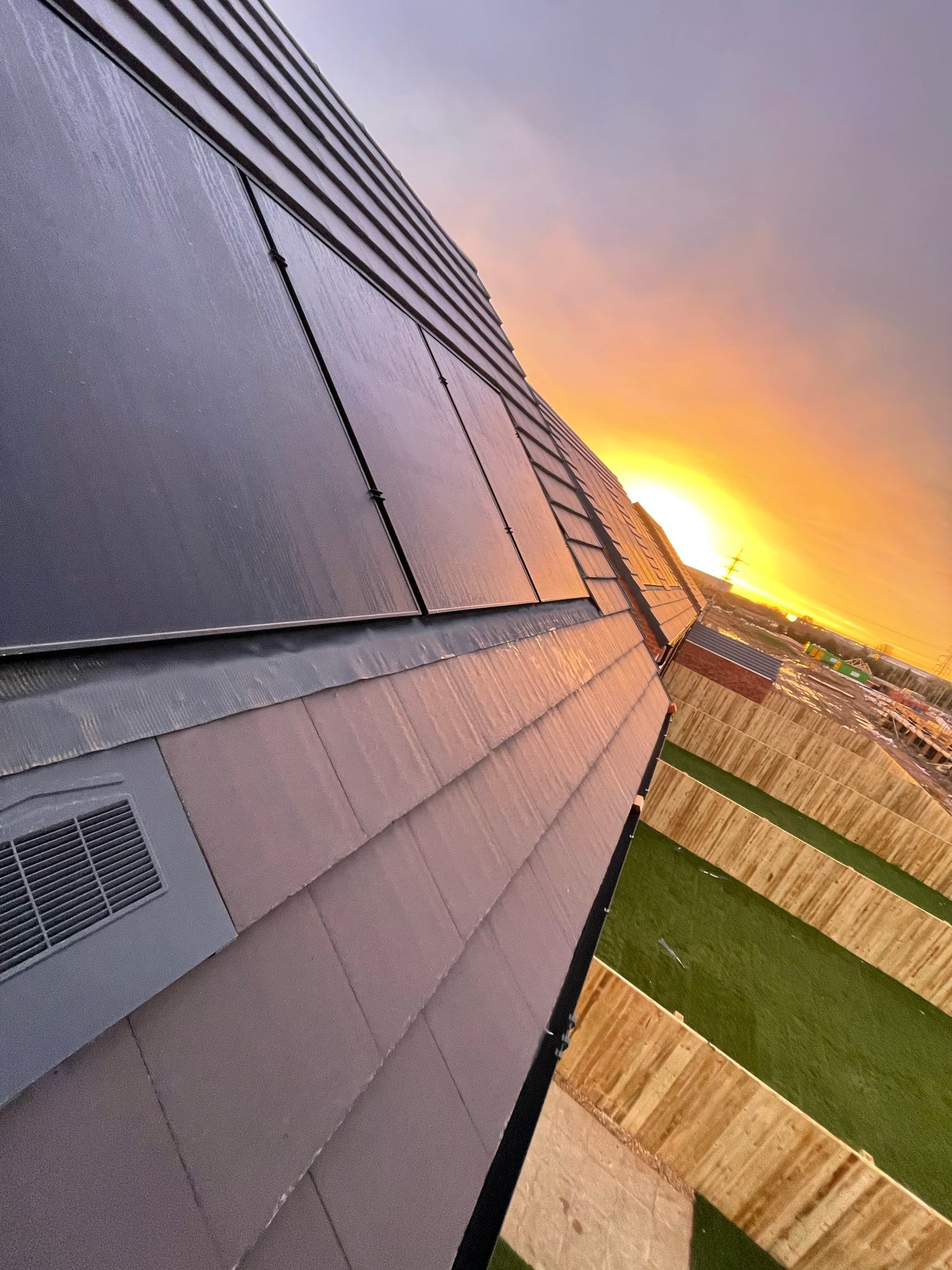 Solar panel on slanted roof at new build site